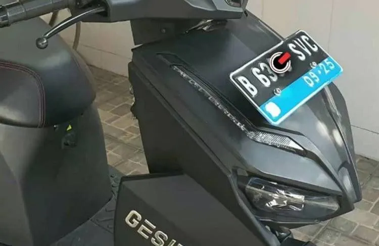 kendaraan listrik plat biru